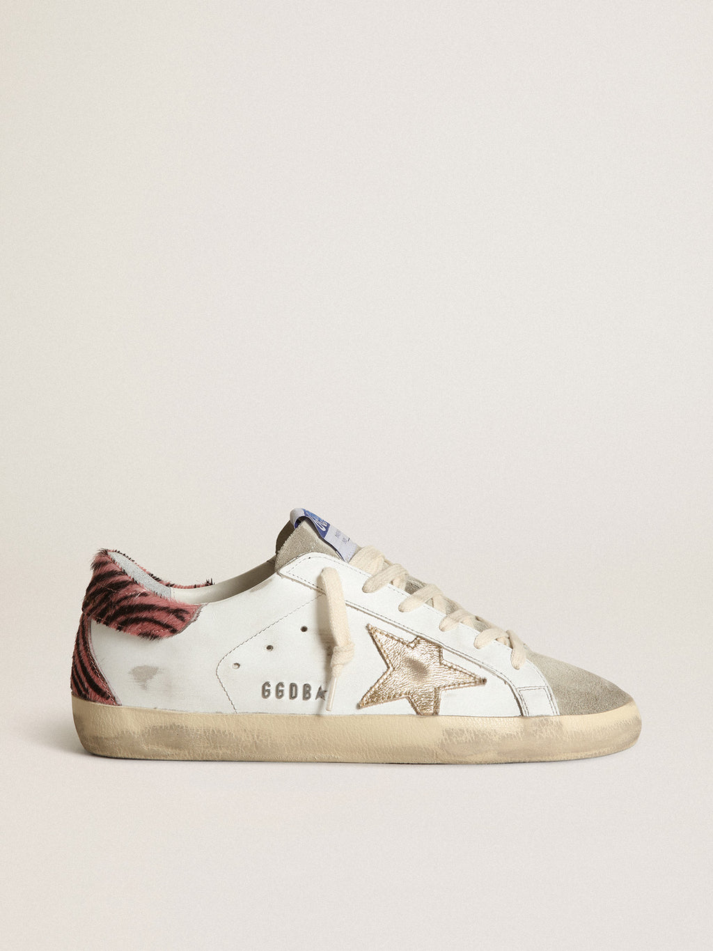 Super-Star with gold leather star and zebra pony skin heel tab| Golden Goose