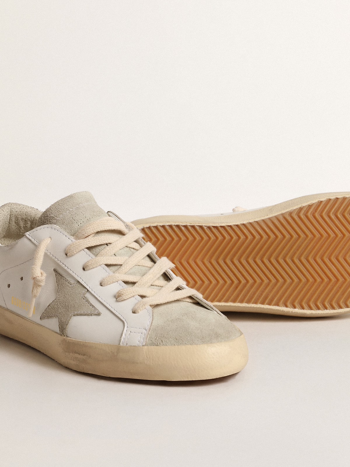 Women's Super-Star with gray star and silver glitter heel tab| Golden Goose