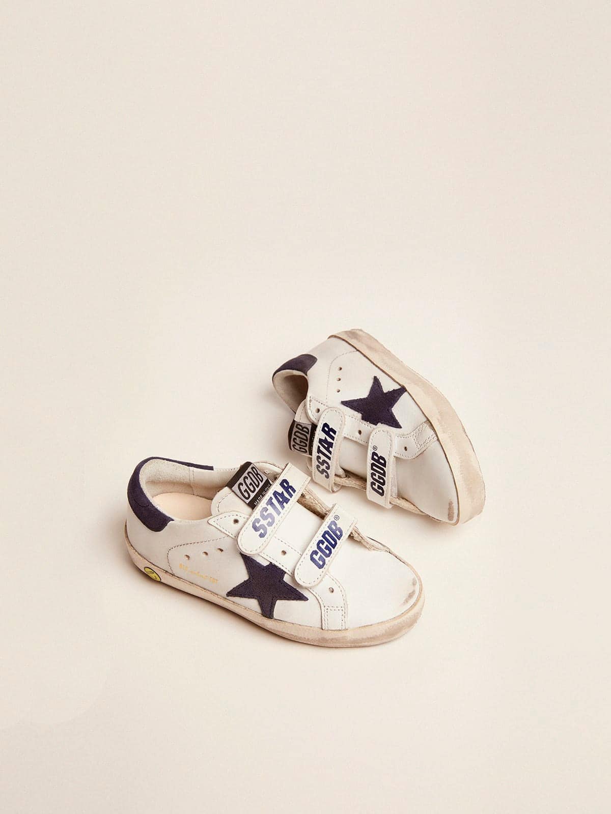 Old School Junior in white leather with blue suede star and heel tab| Golden Goose