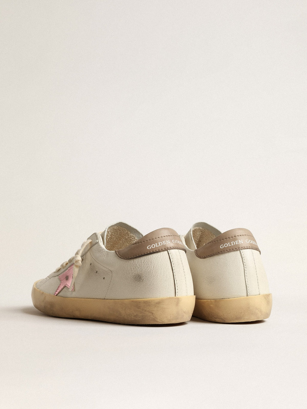 Women's Super-Star in white nappa with pink metallic leather star| Golden Goose