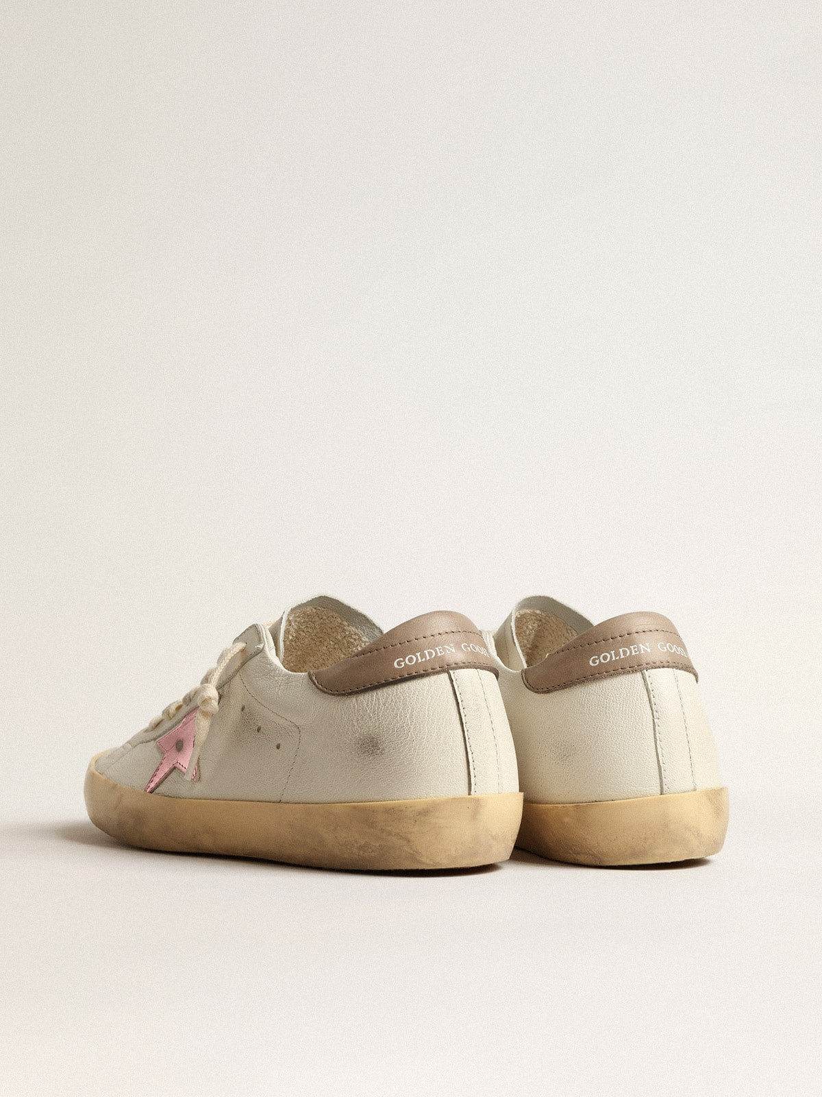 Women's Super-Star in white nappa with pink metallic leather star| Golden Goose